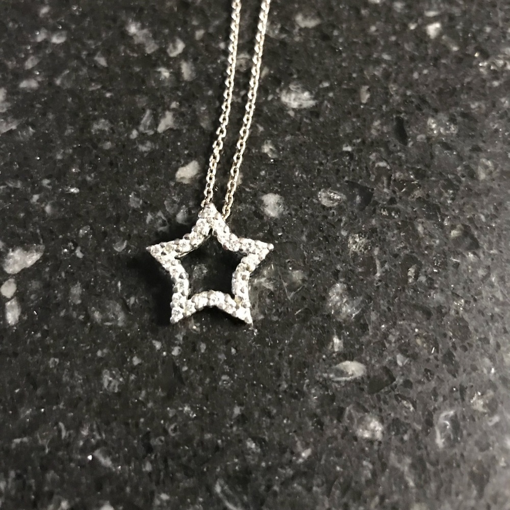 Sterling silver diamond accent star necklace. New